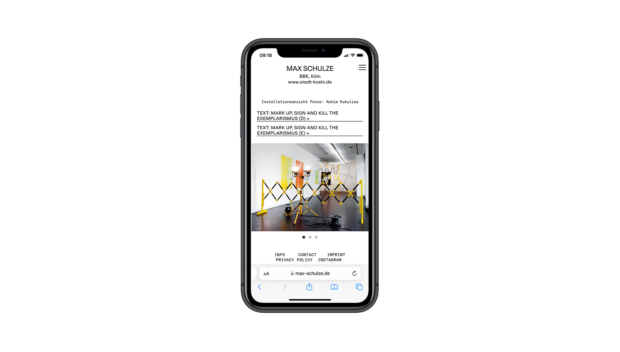 Max Schulze website on iPhone screen